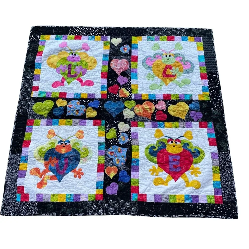 Quilt Four Blocks with Whimsical But Like Creatures Each Holding‎ A Heart